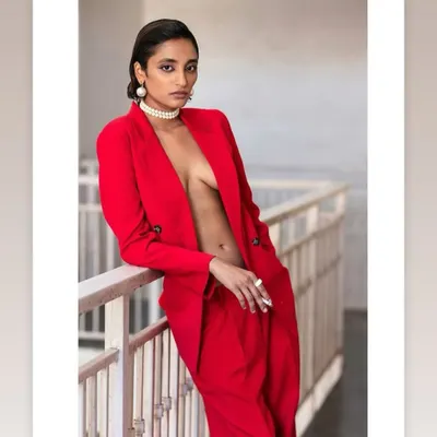 I believe every person deserves to have a portrait that makes them feel powerful and seen. This magazine-style photoshoot is designed to be a transformative experience, capturing your unique essence in a bold, artistic way. Here, the striking red suit and confident pose create a truly unforgettable image.