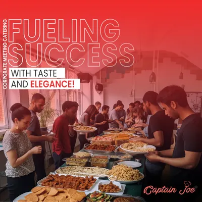 We are experts at fueling success with taste and elegance. This image shows employees enjoying a well-organized buffet line during a corporate meeting, highlighting our capacity to serve large teams efficiently.