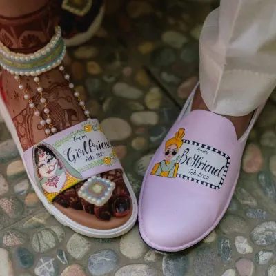It’s all in the details. This shot focuses on the couple's quirky, personalized shoes that narrate their love story. It’s a fun and unique way to capture the personality of the couple.