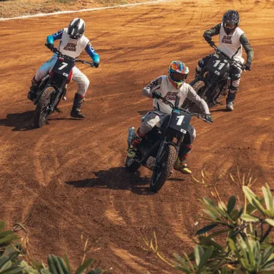 Leading the pack at the Royal Enfield Slide School Cup. Flat track racing requires a unique skill set, managing traction and sliding the bike through corners on a dirt oval.