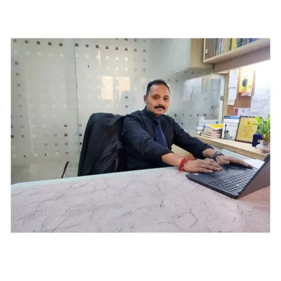 At my desk, where I spend much of my time drafting legal documents and preparing for my online courses. As the saying goes, "Do the best you can until you know better."
