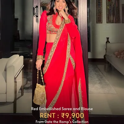 This red embellished saree and blouse is a classic choice for Karwa Chauth, offering elegance and tradition.