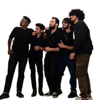 The full band sharing a light moment. We have a lot of fun on and off the stage, and that chemistry is what makes our music click.
