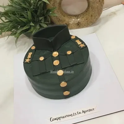 It's a blessing to create something for the heroes of our country. This army uniform cake was for a promotion ceremony to Lieutenant Colonel. The details on the ganache cake are all handcrafted.