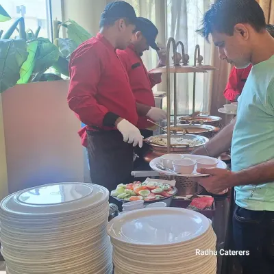 Our team at the buffet counter, ready to serve guests with a smile. We ensure the service is efficient and organized, even during the busiest moments of an event.