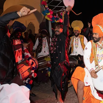 The heart of the party at a 70th birthday celebration in Chandigarh. This was a weekend of unapologetic Punjabi splendor, and this image captures the energy of the Jaago night with dhol players and Bhangra dancers in traditional attire.