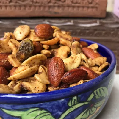 Our Dry Fruit Bhel is a go-to festive snack. It's a perfect blend of rich, roasted dry fruits and savory spices, making it a thoughtful and delicious addition to any gift hamper.