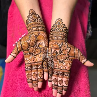 A beautiful trial mehandi design. We offer trial sessions so you can see the quality of our work and finalize the motifs for your big day. This design features peacocks and jharokhas.