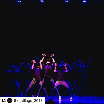 Our crew, House of Dance, performing on stage at "The Village 2018". This photo captures the swagga and bright energy we bring to every community performance.