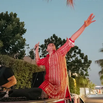 Taking the Baraat energy international! Here I am, on top of the car, hyping up the crowd at a stunning destination wedding in Thailand. No matter the location, the vibe is always 100%.