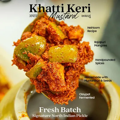 A spoonful of our signature Khatti Keri Mustard pickle. Made with an heirloom recipe, we use fresh Rajapuri mangoes, hand-pounded spices, and cold-pressed mustard oil, all fermented in clay pots for that deep, authentic flavour.