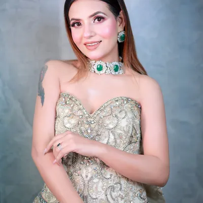A beautiful, smiling portrait of a wedding guest, capturing the joy of the event.