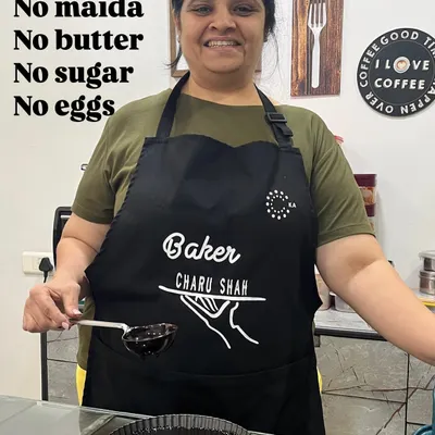 This is my promise to you, written right on my apron. I am a proud Jain home baker, and I create desserts that are pure, healthy, and made with love.