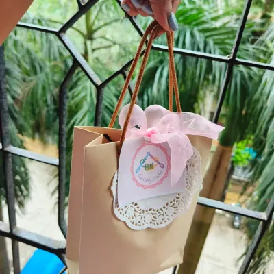 This is how I package my little crochet heart pots. The mini gift bag with a custom tag and doily makes it feel like a very special present.