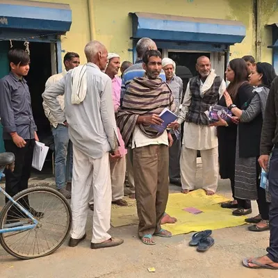 Taking legal awareness directly to the people. Here, I am interacting with residents of a village during a mobile legal aid campaign organized by DLSA, Gurugram, answering their questions and distributing informational materials.