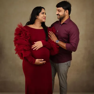 For Rakshita's maternity shoot, we started with this stunning red gown. I kept the makeup soft and romantic to highlight her natural glow, creating a beautiful memory for the parents to be.