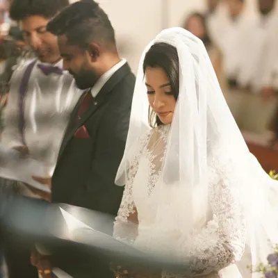 A candid moment during a church wedding ceremony. I created a soft, romantic makeup look for the bride that would look beautiful and feel comfortable throughout the day.
