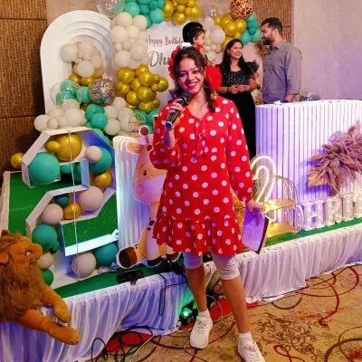 I believe every party should be full of life, and this jungle-themed birthday was no exception. Here I am, mic in hand, ready to kick off the fun and games for the kids and family.