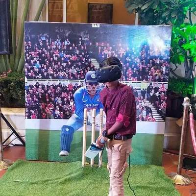A full VR cricket setup for an ICICI corporate event. The experience includes a large backdrop, spectator screen, and professional stanchions to create an authentic and premium feel for your guests.