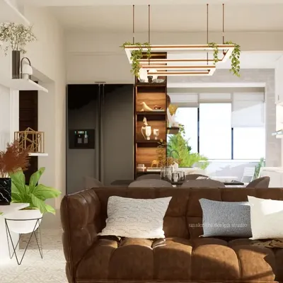 This renovated living space embodies a sophisticated French theme. By removing partitions, we created a seamless flow from the seating area to the dining space, unified by a calm, single-tone palette and carefully selected decor.