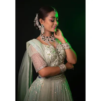This is a beautiful example of my American Diamond (AD) jewellery sets. This layered necklace with black and white stones provides a diamond look and is perfect for pairing with gowns or modern lehengas.