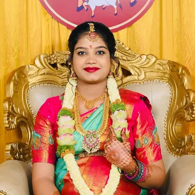 Our beautiful mom-to-be, Navya, celebrating her baby shower. She chose a simple yet elegant gold-finish temple jewellery set that perfectly complements her vibrant silk saree.