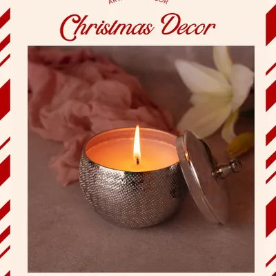 Part of my Christmas decor collection, this nickel-finish candle votive is perfect for adding a subtle festive sparkle. It's a simple piece that brings a lot of warmth.