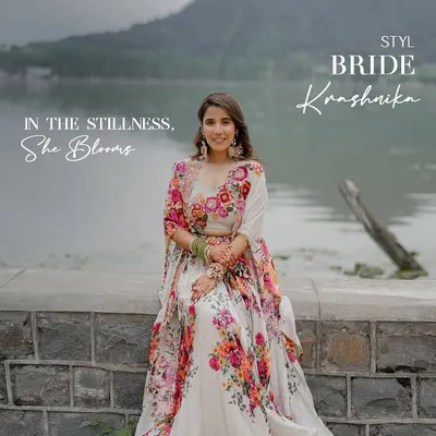 In the stillness of the morning by Dal Lake, our bride Krashnika blooms in a floral Gazal Gupta lehenga for her Haldi ceremony. The look is graceful, radiant, and a perfect reflection of the serene beauty surrounding her.