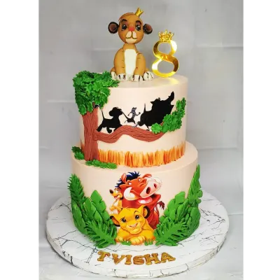 This two-tier Lion King cake is a true showstopper, combining choco-vanilla flavors with detailed scenes from the movie. The handmade fondant Simba on top and the silhouette designs make it a memorable centerpiece for an 8th birthday.