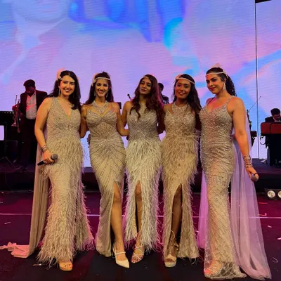 On stage with a group of talented singers for a special event. I love collaborating with other artists and being part of a larger musical ensemble.