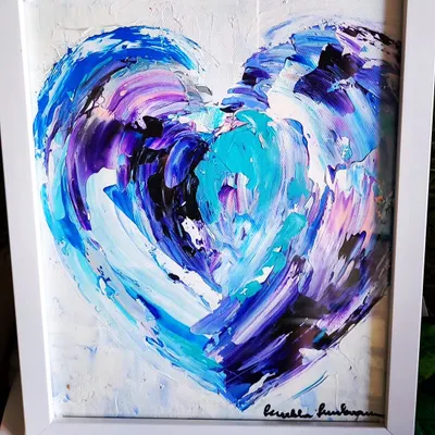 This piece, with its swirling blues and purples, is about the many forms love takes. I use a palette knife to build up thick layers of paint, creating a sense of depth and movement. It’s a bold, contemporary heart painting that makes a statement.