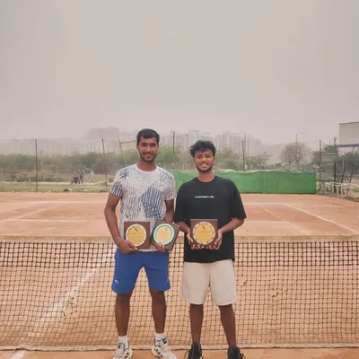 Our coaches are champions too. Here are coaches Utkarsh Tiwari and Uday Saini after clinching the doubles title, with Utkarsh also winning the singles. They bring a champion's mindset to every lesson.