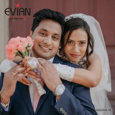 A beautiful shot of our wedding couple. We offer packages that include makeup for both the bride and groom, ensuring you are both perfectly styled for your special day.