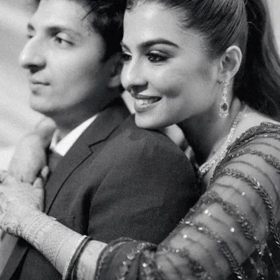 A quiet embrace during a lively sangeet. I captured this black and white portrait of Radhika and Shyam to freeze this one serene moment amidst the celebration, focusing purely on their connection.