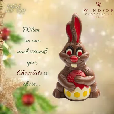 My Easter Bunny chocolate figure, holding a decorated egg. This piece uses milk, white, and colored chocolate for a festive look.