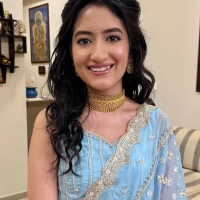 A dreamy glow for her roka ceremony. I used a subtle eye look and a natural flush to complement her pastel blue outfit, creating a look of timeless elegance.