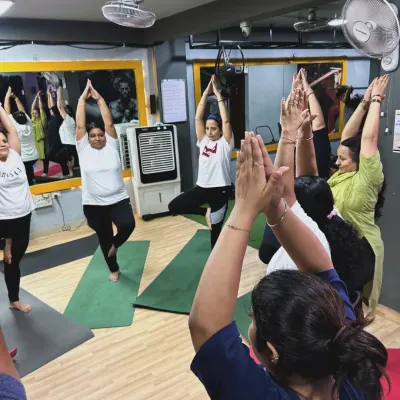 In our studio, we practice Vrikshasana (Tree Pose) together, finding our individual balance while being supported by the group's collective energy. It's a beautiful dance of every cell with the music of every breath.