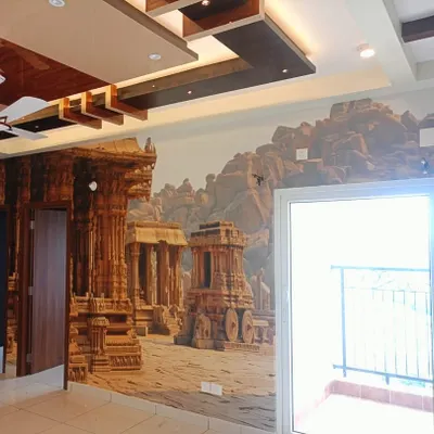 A grand Hampi-themed mural installed in a spacious living room. I carefully wrapped the design around the corner and door frame to create an immersive, panoramic view of the ancient ruins.
