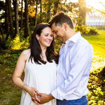 A tender moment between partners during their sunset maternity shoot. The warm light filtering through the trees created such a romantic and intimate atmosphere for their pregnancy portraits.