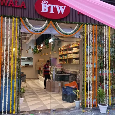 For the launch of this BTW store, I used traditional marigold and tuberose garlands to create a festive and welcoming entrance. This style is perfect for grand openings that need a classic touch.
