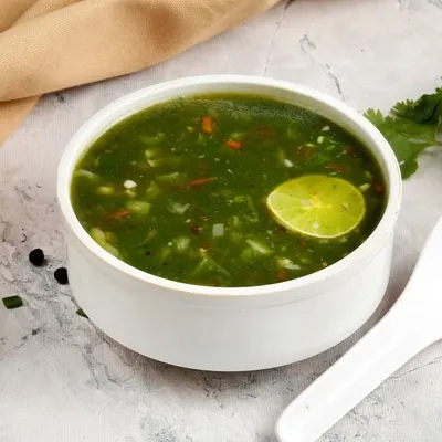 Our light and tangy Lemon Coriander Soup. This clear soup is packed with fresh coriander and a zesty lime flavour, making it a refreshing start to your meal.