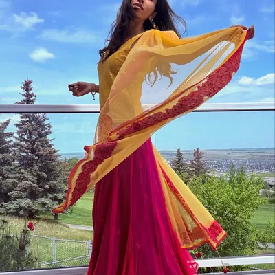 A photo capturing a feeling of being unfettered and sky-high. The movement in my dupatta reflects the freedom I feel when I dance.