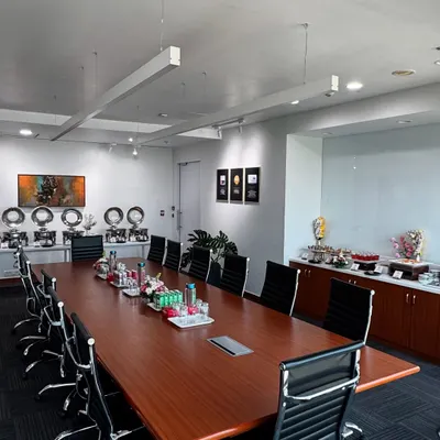 We transform office spaces into elegant dining venues. This was our setup for a boardroom lunch for HDFC Life, where we arranged the buffet and dessert counters neatly within their meeting room for a seamless experience.