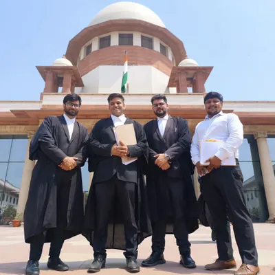 Celebrating a memorable victory with my team on the steps of the Supreme Court. Success in the highest court is always a result of meticulous preparation and dedicated teamwork.