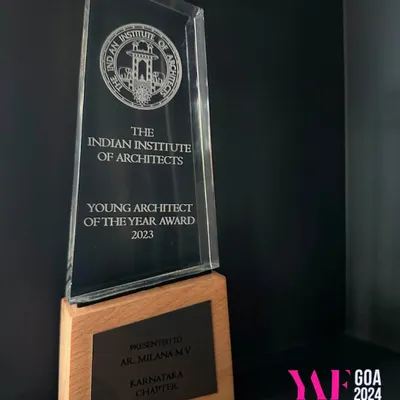 A detailed view of the 'Young Architect of the Year Award' trophy for 2023. Presented by the Indian Institute of Architects, Karnataka Chapter, this award is a significant honor that celebrates our commitment to design excellence and innovation in the field.