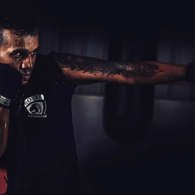 This is the focus and intensity we cultivate in every session. Here, a trainee executes a perfect cross, channeling power from the core. This level of dedication is what builds not just a fighter, but a resilient individual.
