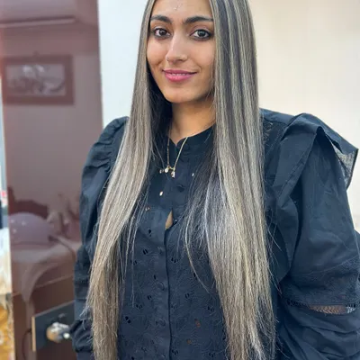 A stunning ash highlights hair color transformation on super long hair. The cool tones are blended perfectly.