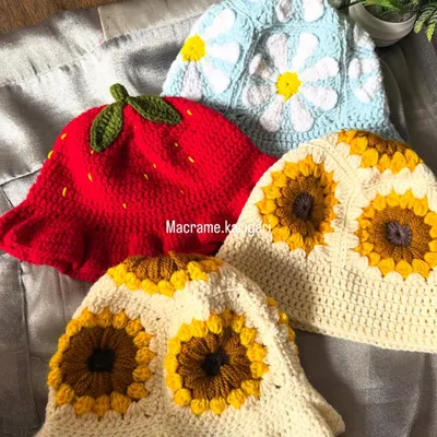 We offer a variety of crochet bucket hat designs, including the popular strawberry, daisy, and sunflower patterns. Each one is handmade with breathable yarn, making them a fun and stylish accessory for sunny weather.