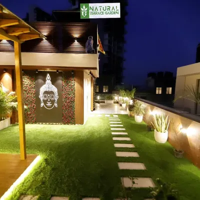 The Gwal Pahari terrace at night. Our lighting design highlights the pathway, the feature wall, and the plants, creating a serene and beautiful atmosphere.