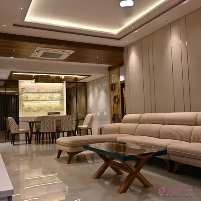 I believe in creating spaces that feel both grand and welcoming. This living and dining room project in Thane features custom furniture, layered lighting with a false ceiling, and a cohesive color palette to connect the two zones.